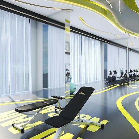 Royal M Al Aqah Beach Resort By Gewan Ngoại thất bức ảnh The gym at the hotel